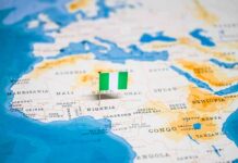 Nightfall Massacre Stuns Busy Market Map of Africa with a pin flag marking Nigeria