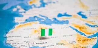 Map of Africa with a pin flag marking Nigeria