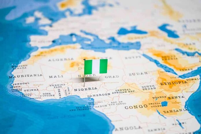 shutterstock_1326882539 Map of Africa with a pin flag marking Nigeria