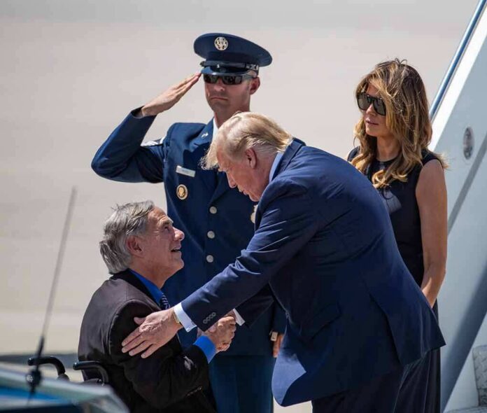 Donald Trump greets Greg Abbott as Melania Trump and Daryl Harper look on at an airport