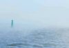 Robot Duel Shocks Black Sea Green buoy in foggy sea