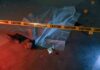 College Star Killed – Shocking Parking Lot Attack crime scene body under sheet behind caution tape