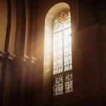 sunlit stained glass window in a church interior