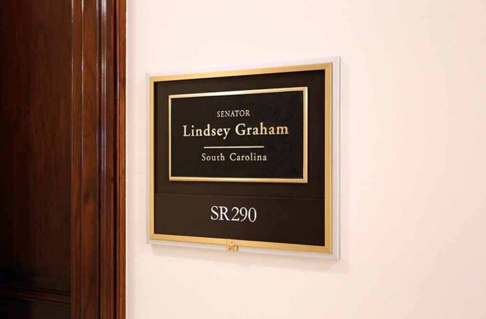office wall plaque with black and gold nameplate and room number
