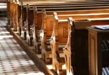 Orthodox Villages Torched – Horror in Ethiopia wooden church pews in sunlight