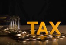 Yellow TAX letters among coins and a tipped jar