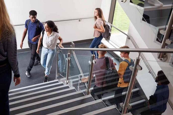 Students walking on a school staircase