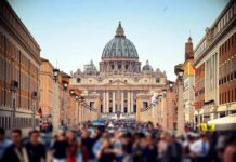 Bishop Blasts ‘Inclusion’ Gap at Vatican St. Peter's Basilica viewed from a busy street with crowds