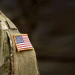 Marine Murder Shock Triggers Tokyo Fury american flag patch on camouflage uniform sleeve
