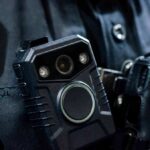 Trust Erodes as DHS Blocks Auto Cams Body-worn camera attached to a uniform
