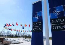 NATO flags and banners outside headquarters