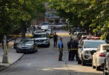 Rape-Murder Case Sparks Fury In France Police officers secure a residential street with patrol cars and yellow tape