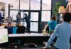 Clothing store interior with staff near entrance during tense incident