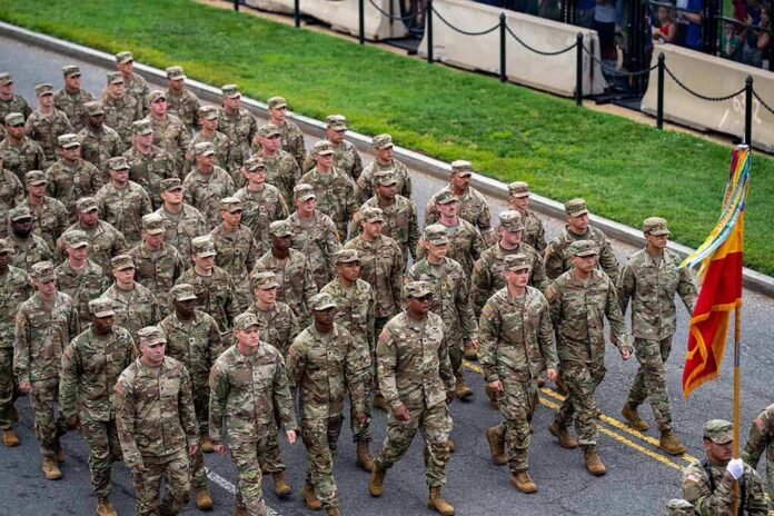 Soldiers in camouflage uniforms march in formation on a street