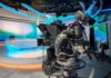 robotic television cameras on a modern news studio set