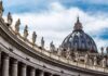 Vatican Clash Erupts Over Polygamy St. Peter's Basilica dome with statues along colonnade