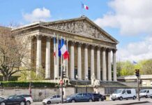 Diplomat Ambushed In Tehran – Paris Fumes Neoclassical building with columns and French flags