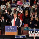 Farm Fuel Shake-Up Sparks Midterm Heat Donald Trump addresses a rally crowd at a podium, raising his fist