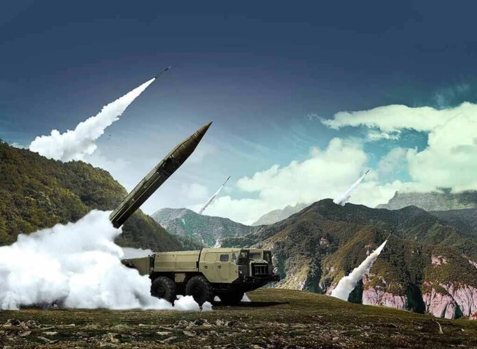 mobile missile launcher firing in mountain landscape